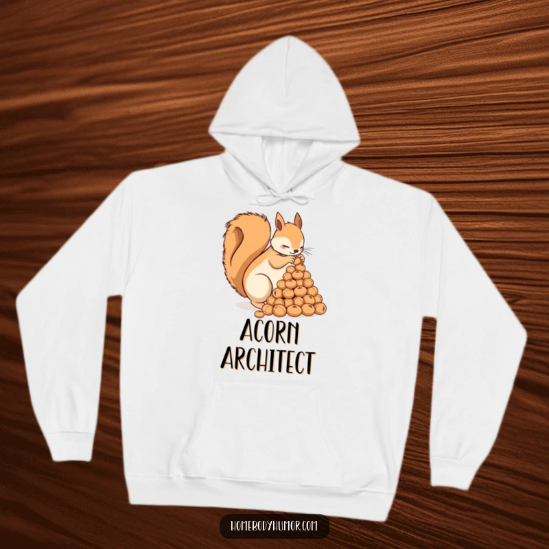 Funny Squirrel Hoodie: A busy squirrel meticulously arranging nuts into a pyramid, offering warmth and funny charm. A superb funny gift.