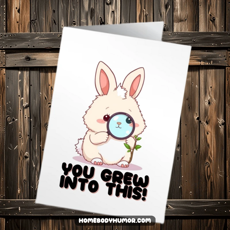 Funny Free Printable congratulations card showing a fluffy bunny peering through a magnifying glass at a small, growing plant.
