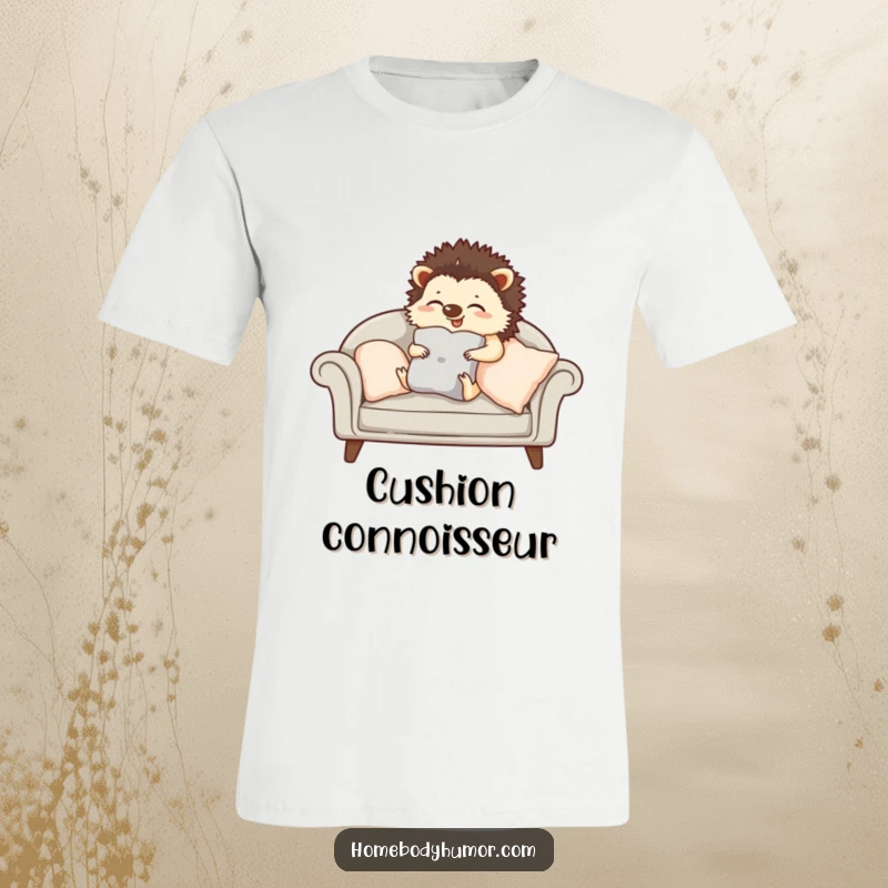 Giggling hedgehog carefully arranging cushions on a sofa t-shirt, a humorous and soft garment for home lovers.